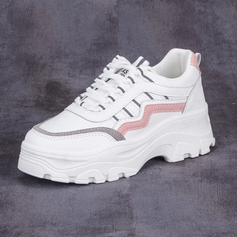 Small white shoes with thick soles
