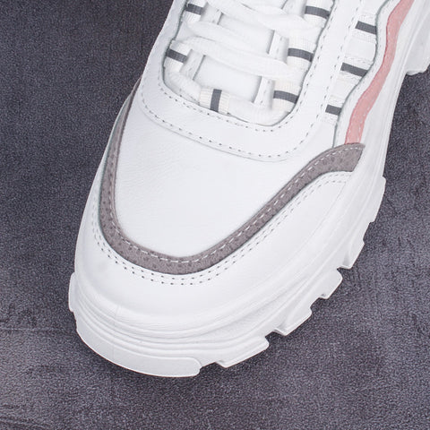 Small white shoes with thick soles